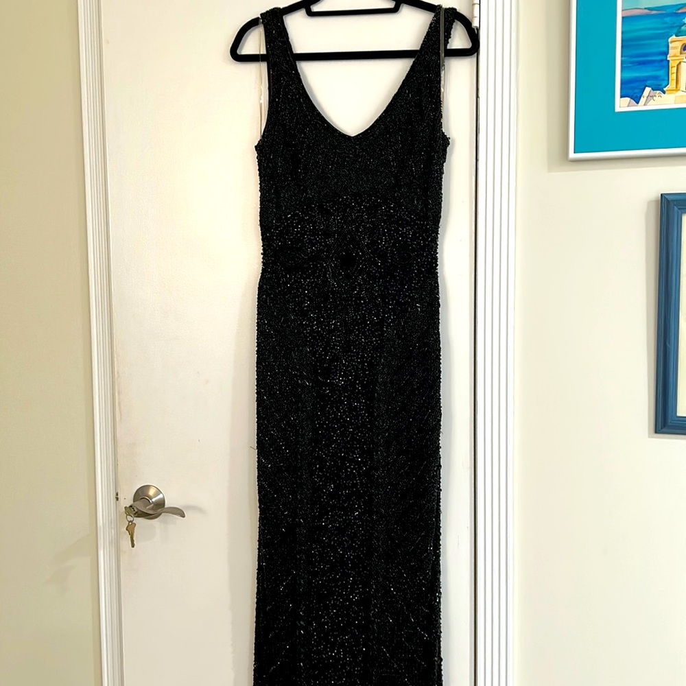 Black fully beaded gown lined with dark red with v neck and v back